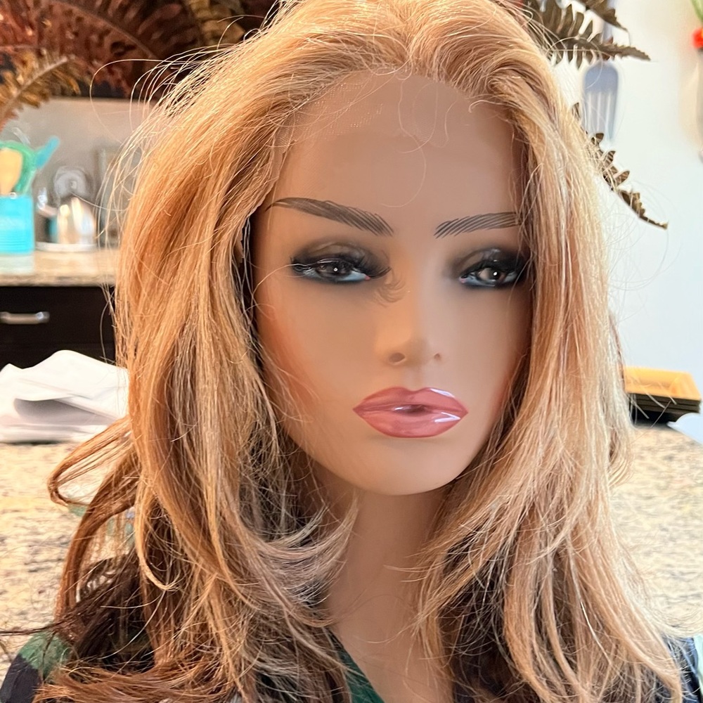 Beautiful brand new synthetic wig unit.